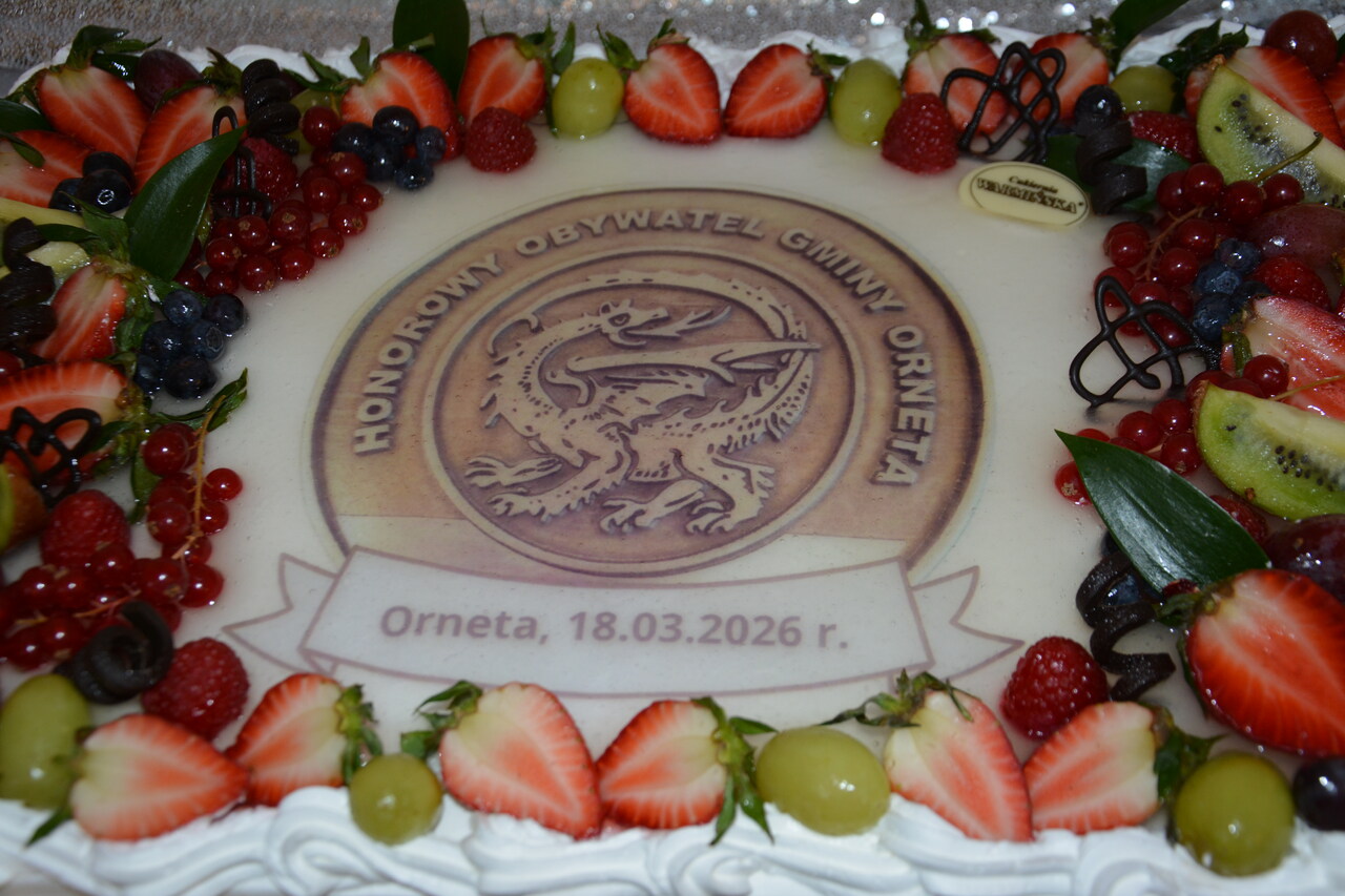 Tort z symbolem - Honorowy Obywatel Gminy Orneta